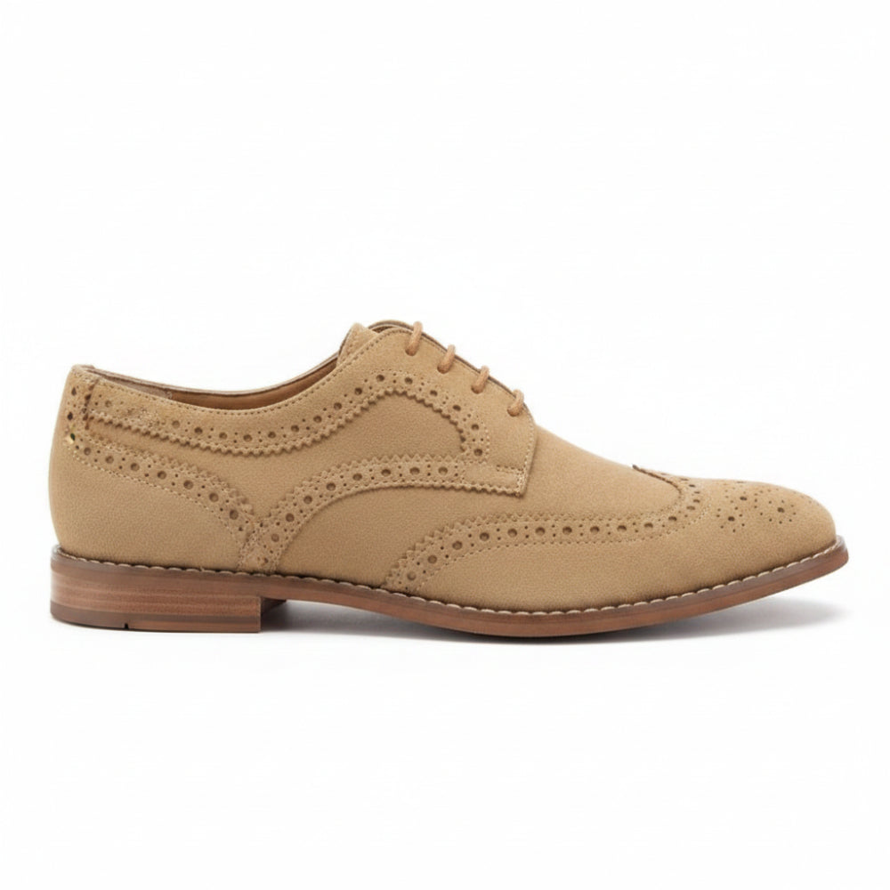 A tan suede wingtip oxford shoe with decorative perforated brogue detailing and matching laces, shown from a three-quarters angle on a white background.