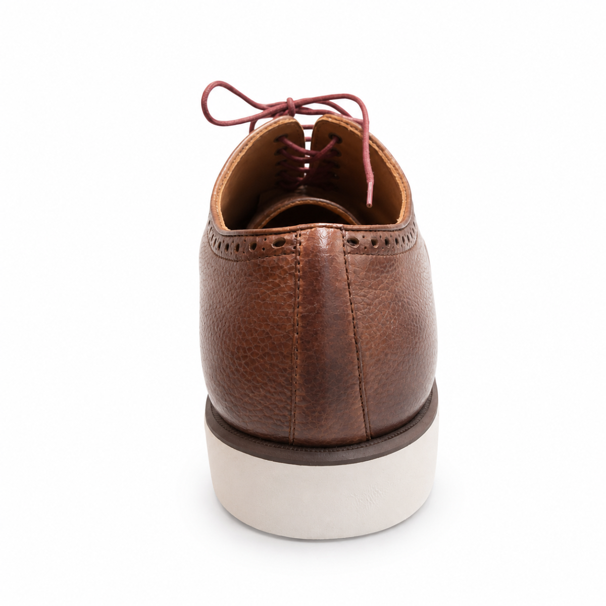 A brown pebbled leather lace-up shoe shown from a rear three-quarter view, featuring a thick off-white platform sole and burgundy laces, set against a plain white background.
