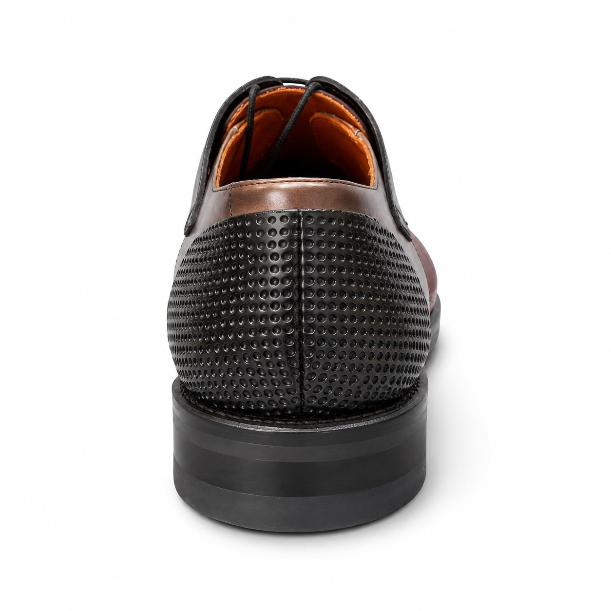 A single men's dress shoe shown from the back, featuring a black perforated leather upper, a brown leather heel cap, and a black sole, photographed on a white background.