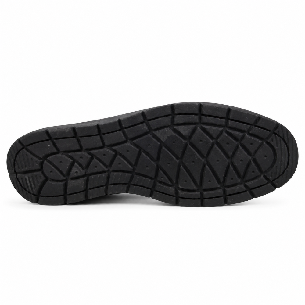 Black sole of a shoe with tread pattern on a white background