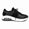 A black and white athletic sneaker with a breathable mesh upper, black laces, and a thick white midsole featuring a clear air cushion unit.