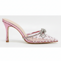 A metallic pink pointed-toe mule high heel with rhinestone embellishments, a crystal-encrusted strap, and a decorative crystal bow on the toe, shown against a plain white background.
