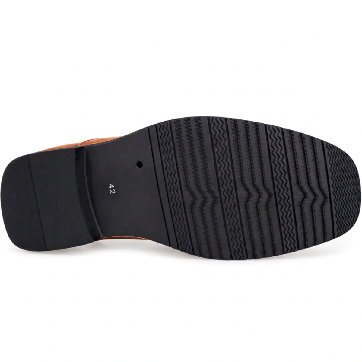 The outsole of a brown leather shoe, showing a black treaded rubber bottom with a size 42 marking,