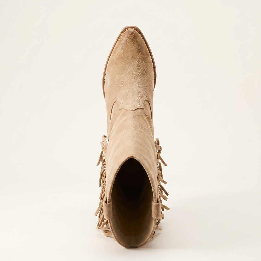 A single light tan suede ankle boot with fringe detailing along the sides, shown from a top-down view on a plain off-white background.