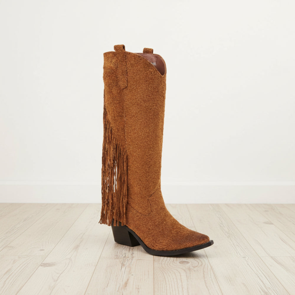 A single brown suede fringe boot with a low black block heel, shown against a plain white background.