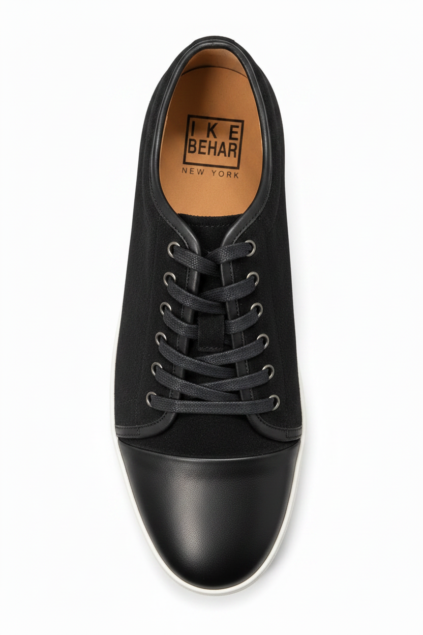 top view of a suede black sneakers from the brand ike behar 