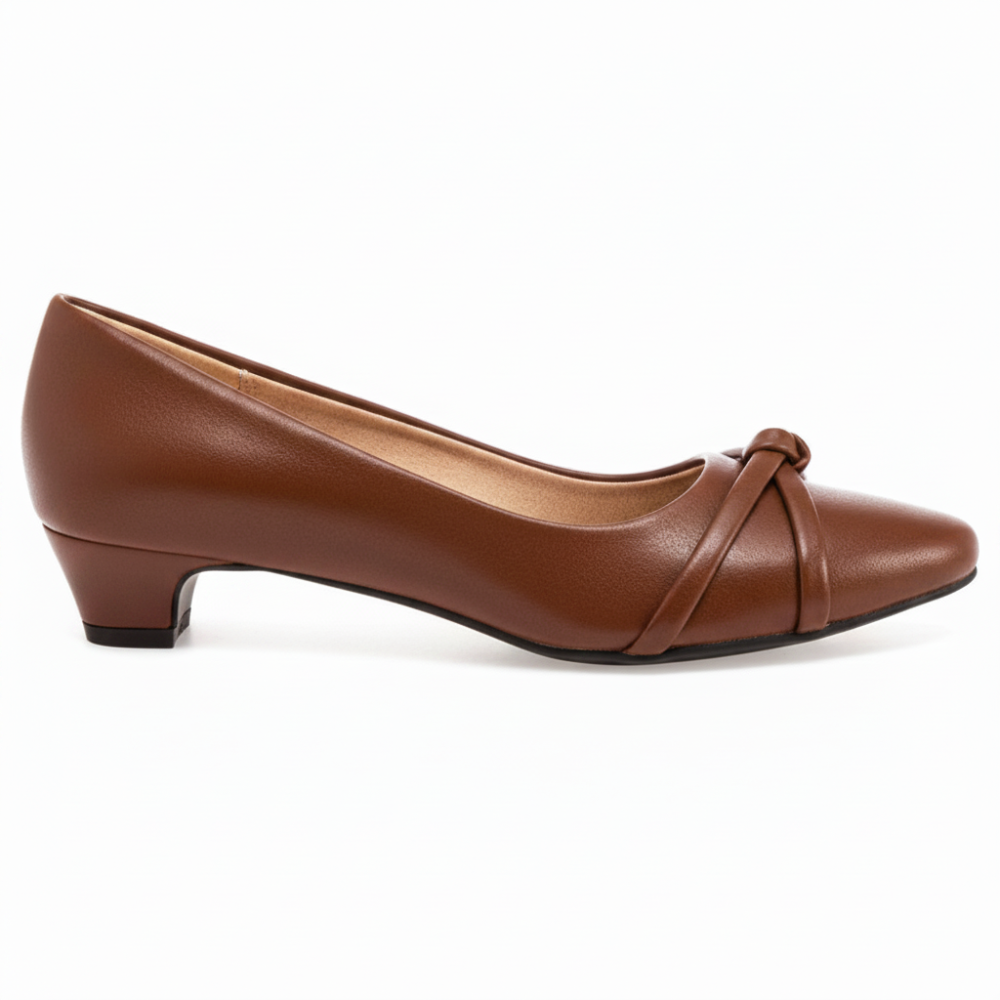 A single brown leather pump shoe with a low block heel and a decorative knotted strap detail on the toe, shown in profile against a plain white background.