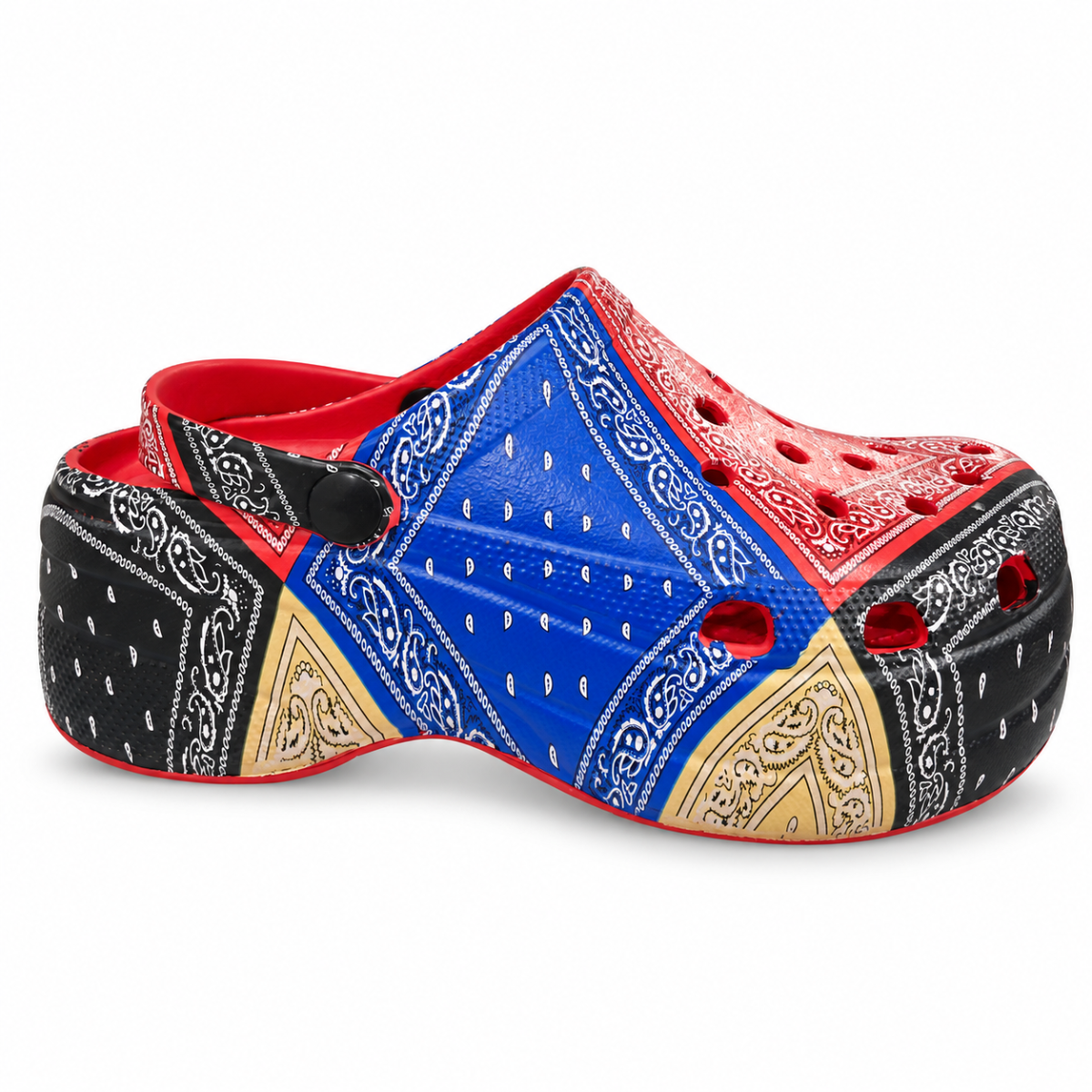 A single platform clog shoe featuring a bold bandana print pattern in blue, red, black, and beige, with a bright red interior lining and strap.