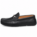 A single black leather loafer with a silver horsebit detail on the vamp, shown in a side profile against a white background.