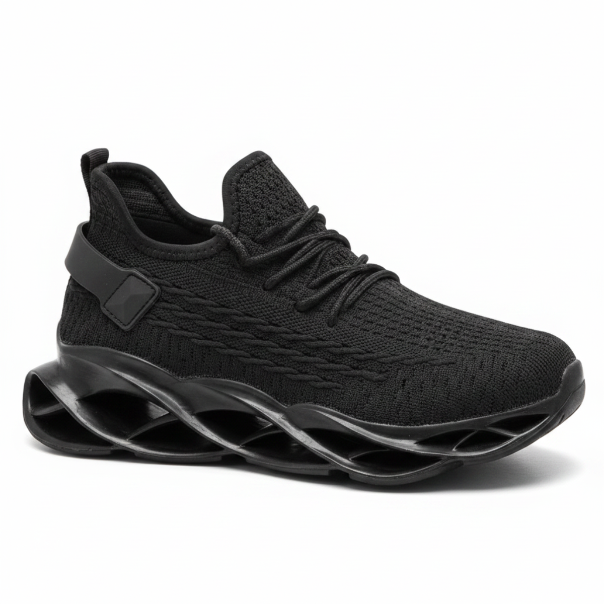 A black knit athletic sneaker with a thick, sculpted wavy sole, shown from a side profile view against a plain white background.