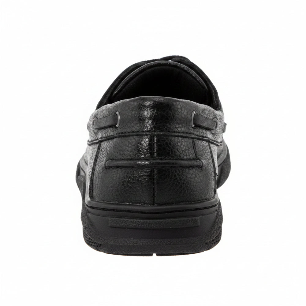 Navy blue children's athletic shoe with a velcro strap on a white background